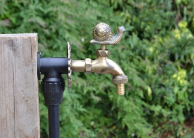 Snail ornamental garden tap brass colour