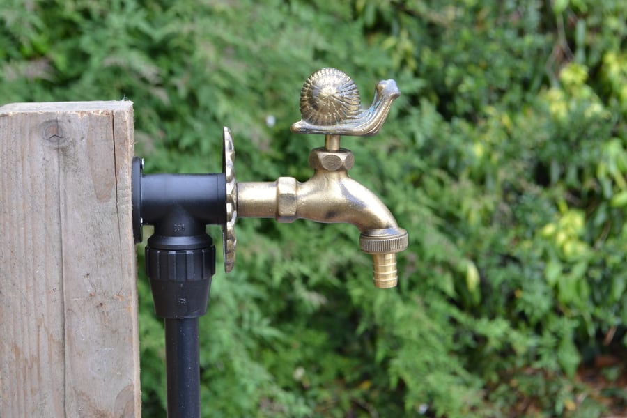 brass colour Snail ornamental garden tap