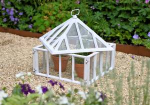 Victorian style cast iron cloche in garden