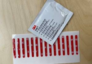 Adhesive pads for handles